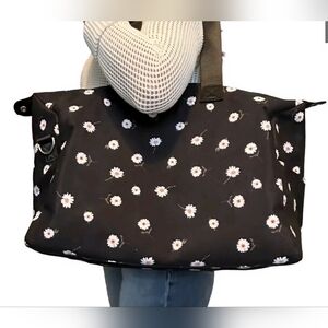 Alice + Olivia Black Daisy Print Duffel Bag By Stacey Bendet